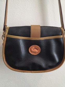 Vintage Dooney & Bourke All Weather Leather (AWL) Crossbody / Saddle Bag in black pebbled leather with tan trim