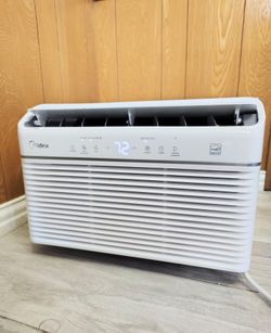 Midea 12,000 BTU SmartCool  Window Air Conditioner. AC unit only. Attachments and box are NOT INCLUDED