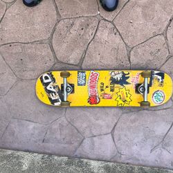 Skateboard With Indie Trucks And Spitfires 