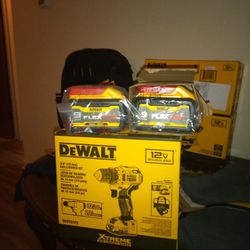 3/8 Drill With Two Batteries  And Two FLEXVOLT 9 AH BATTERIES. 