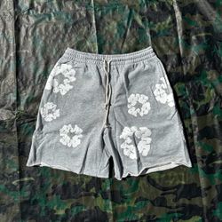 gray denim tear shorts 
