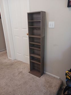 Skinny bookshelf for CDs or knick knacks