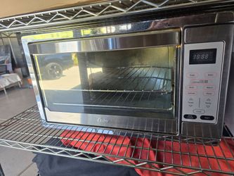 Oster Oven. Can fit a full size Pizza!