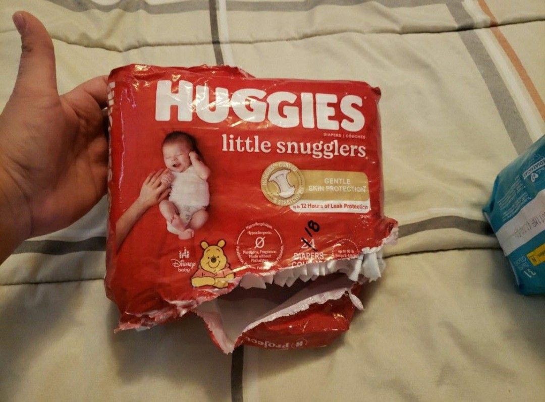 HUGGIES And PAMPERS Both Are Size NEWBORN