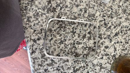 Headlamp Trim. Hold Down Free New