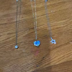 3 necklaces, 2 fake gold, 1 fake silver