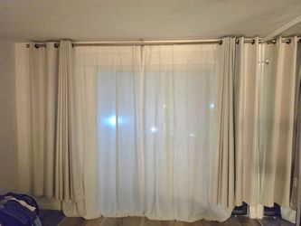 Beige black out curtains 84in long 50 in wide