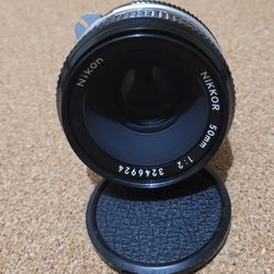 Nikon Nikkor 50mm F2  (contact info removed) Lens Excelent Condition.

