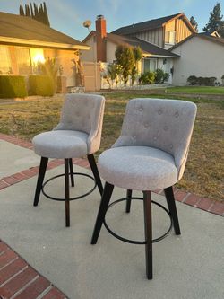 Upholstered fabric swivel bar stools; 2 for $80