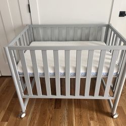 Fold Away Crib w/ Mattress (barely Used)