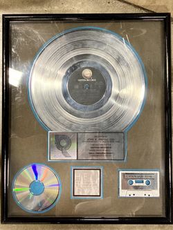 Music memorabilia plaque Eagles hell freezes over platinum record with city and cassette player in it