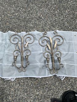 Two wall hanging candle holders