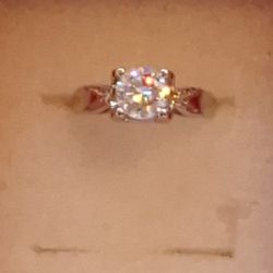 Is A 1 Carat Moissanite Diamond Ring Set In Sterling Silver That Is Adjustable It Is Brand New I Have A Diamond Tester To Show You It Will Test Positi