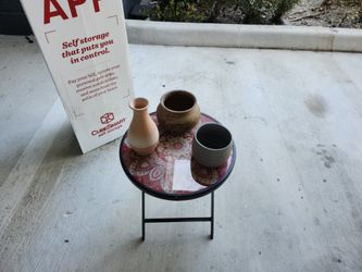 A crate full of flower pots