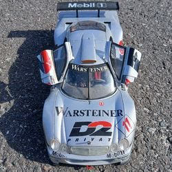 This item is a 1:18 scale diecast model of a 1998 Mercedes-Benz CLK-GTR, likely manufactured by Maisto.