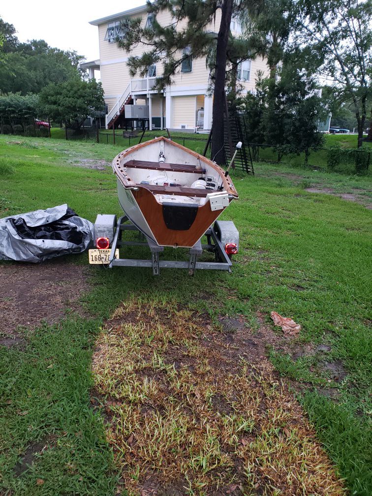 Homemade wooden boat and trailer