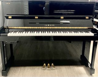 Built in 2010 Japan Yamaha Upright piano with silent feature Free delivery and tuning