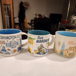 three Starbucks collectible mugs,  "Been There"  "You Are Here" series, 14 ounces, microwave, dishwasher safe, the mandalorian mug, good condition,all
