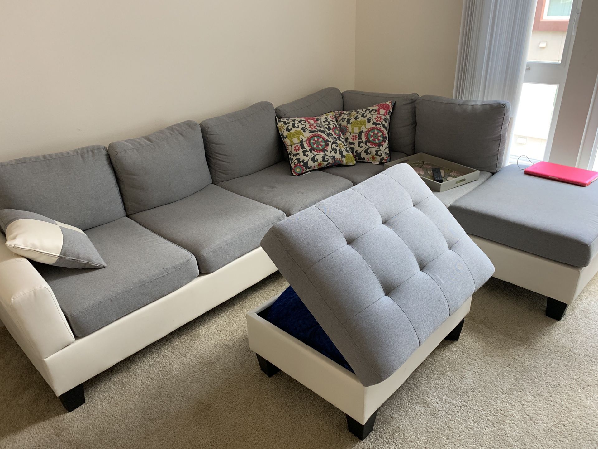 Sectional couch with storage ottoman