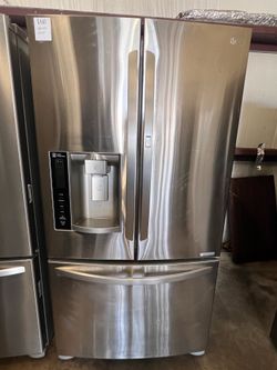 LG French door refrigerator with door in door. 6 month warranty.