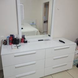 white bedroom and desk set