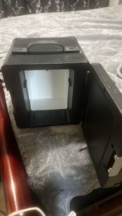Mini refrigerator with built in radio