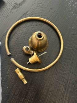 Solid brass towel holder with a 1.5" diameter ring. Includes all mounting hardware.