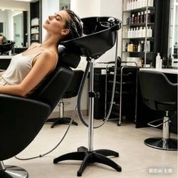 portable shampoo bowl features a stainless steel stand and a star-shaped base for stability.