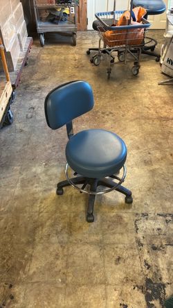 Blue Vinyl Rolling Stool with Back