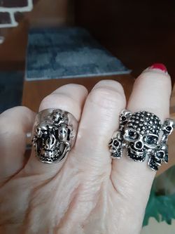 2 SKULL RINGS