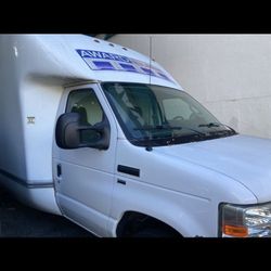 2012 Ford E-350 Box Truck cutaway with a 16-foot Unicell box and a 5.4L V8 flex-fuel engine