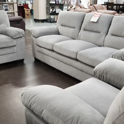 Light gray fabric sofa love and chair