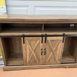 Tv stand/ Entertainment center
