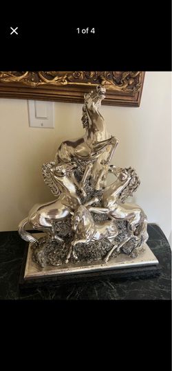 Silver horse sculpture