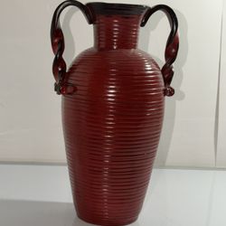 Red decorative vase with twisted handles