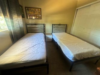 Twin beds with mattress