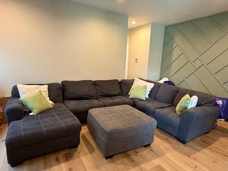 Gray sectional with ottoman