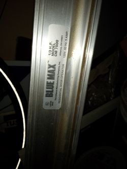 Garage Door Open  - Remote Included  - Good Condition 