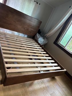 Solid bed frame