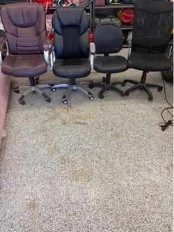 Four office chairs