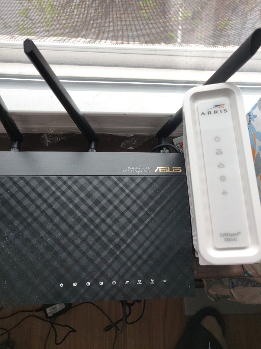 Modem and router, perfectly working excellent condition. Arris surfboard sb6141 and Asus rt-ac66u router