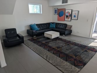 Modern 3-Piece Living Room Set – Black Sectional, Armchair & White Ottoman
