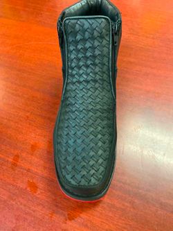 Zapatos de piel petatillo con suela roja y con cierres