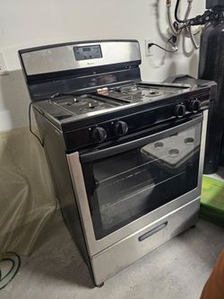 Black and stainless steel gas stove