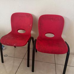 Two plastic kids chairs
