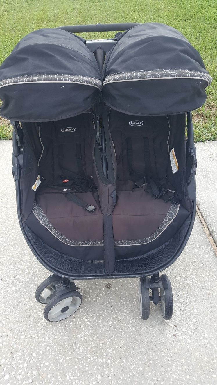 Graco Color Black, Baby Trend Double Stroller $40.