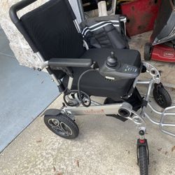 A Medwarm Motorized Chair With Joy Stick