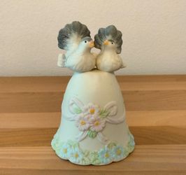 Bell with lovebirds