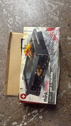Girl and raclette open box