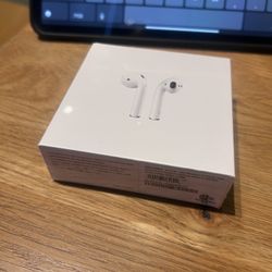 APPLE AIRPODS WITH WIRELESS CHARGING CASE - BRAND NEW SEALED IN PACKAGE